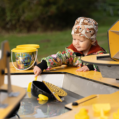 Girl playing with water.